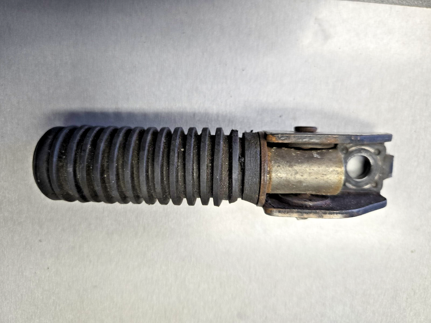 1975 Honda CB500T CB 500 Twin H379-1 rear passenger foot peg #0590